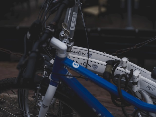 Blue and white folding bicycle