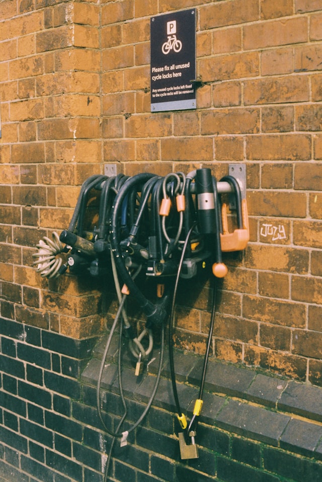 Bicycle locks and chains on a wall